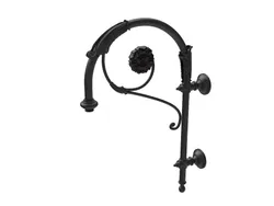 Cima a pastorale a muro con doppio riccio ornamentale ed ornamenti floreali tipo Borromini