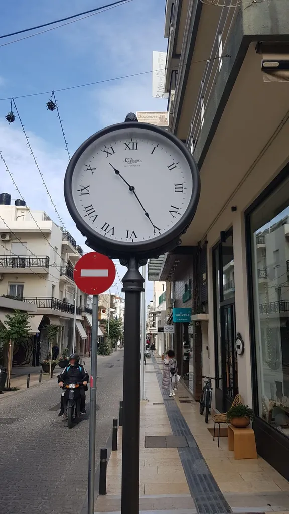 olologio artistico heralio di creta city front frontale